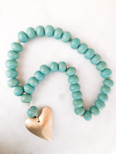 Aqua Wooden Beads With Gold Heart